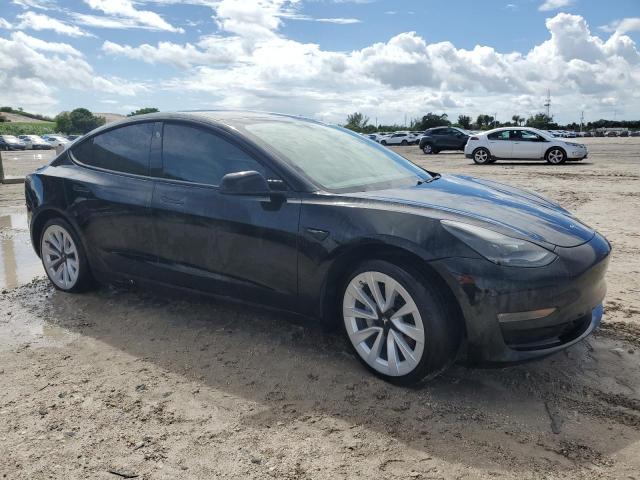 5YJ3E1EB6MF983708 - 2021 TESLA MODEL 3 Schwarz Foto 4