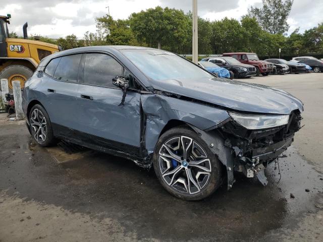 WB523CF0XRCN12784 - 2024 BMW IX XDRIVE50 Mavi foto 4