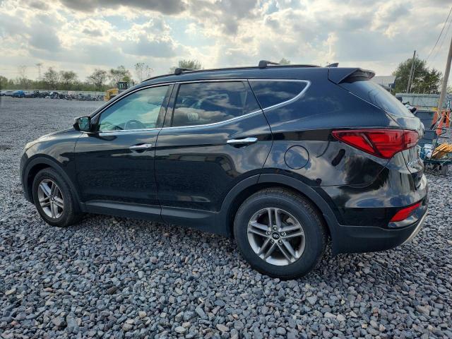 5NMZUDLB9HH016354 - 2017 HYUNDAI SANTA FE S Черный фото 2