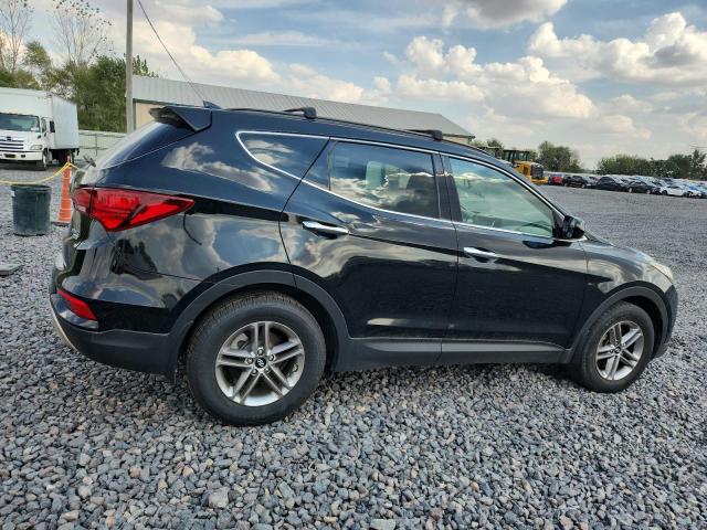 5NMZUDLB9HH016354 - 2017 HYUNDAI SANTA FE S Черный фото 3