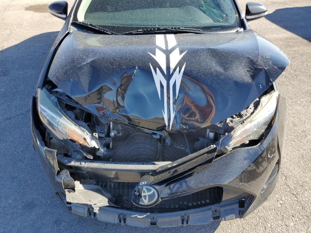 5YFBURHE7JP741092 - 2018 TOYOTA COROLLA L შავი ფოტო 11