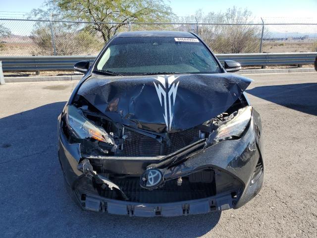 5YFBURHE7JP741092 - 2018 TOYOTA COROLLA L შავი ფოტო 5