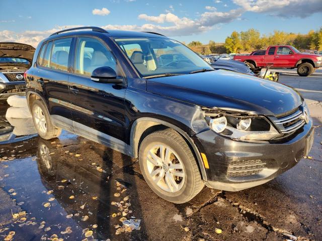 WVGAV7AX5FW524725 - 2015 VOLKSWAGEN TIGUAN S BLACK photo 4
