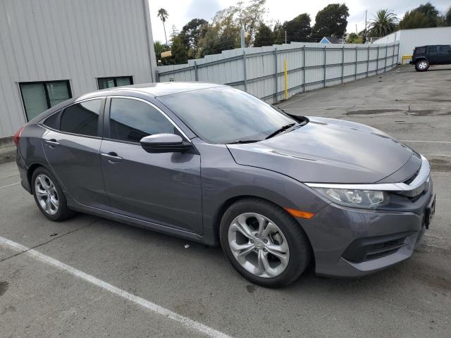 2HGFC2F54JH512813 - 2018 HONDA CIVIC LX ნაცრისფერი ფოტო 4