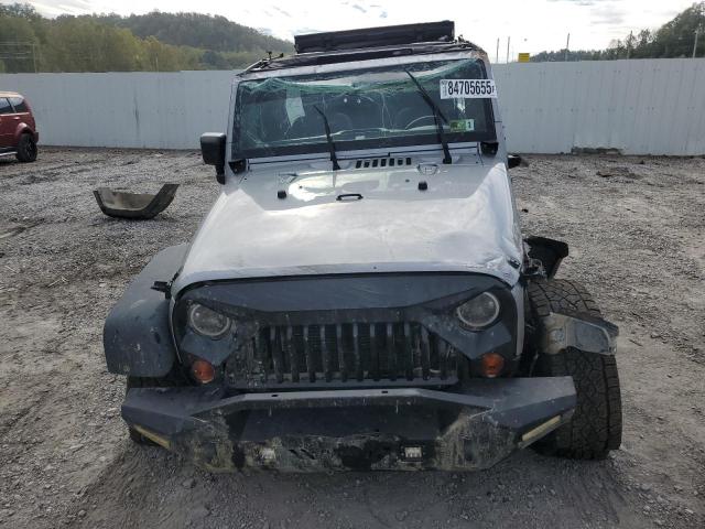 1C4HJWDG3DL546404 - 2013 JEEP WRANGLER U SPORT SILVER photo 5