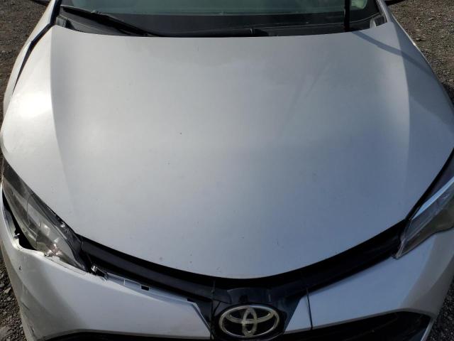 5YFBURHE7HP703002 - 2017 TOYOTA COROLLA L SILVER photo 11