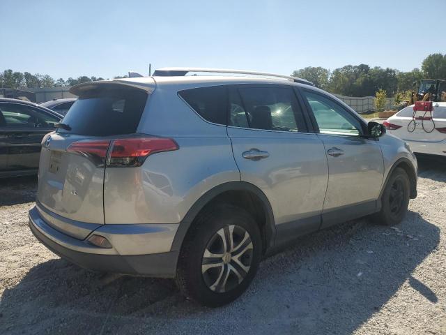 2T3ZFREV6GW311209 - 2016 TOYOTA RAV4 LE SILVER photo 3