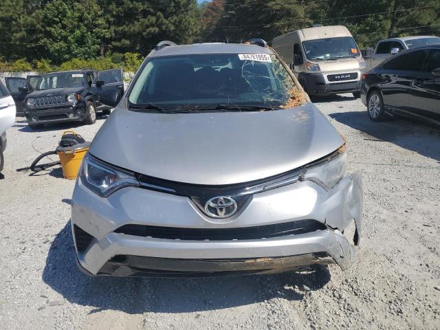 2T3ZFREV6GW311209 - 2016 TOYOTA RAV4 LE SILVER photo 5
