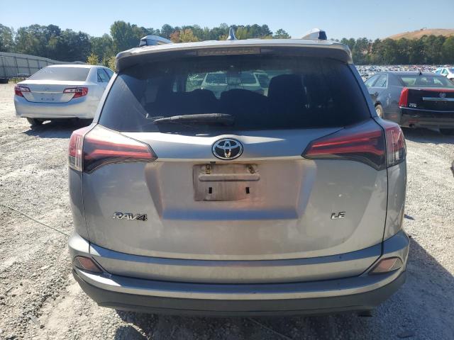 2T3ZFREV6GW311209 - 2016 TOYOTA RAV4 LE SILVER photo 6