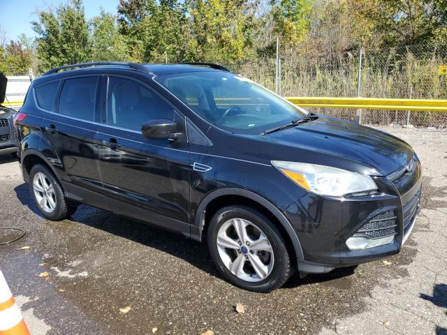 1FMCU9GX9EUC86130 - 2014 FORD ESCAPE SE BLACK photo 4