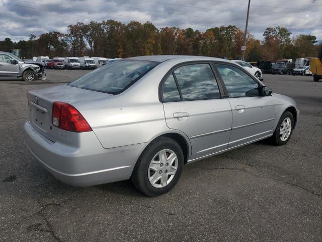 2HGES16583H620010 - 2003 HONDA CIVIC LX 银色 照片 3