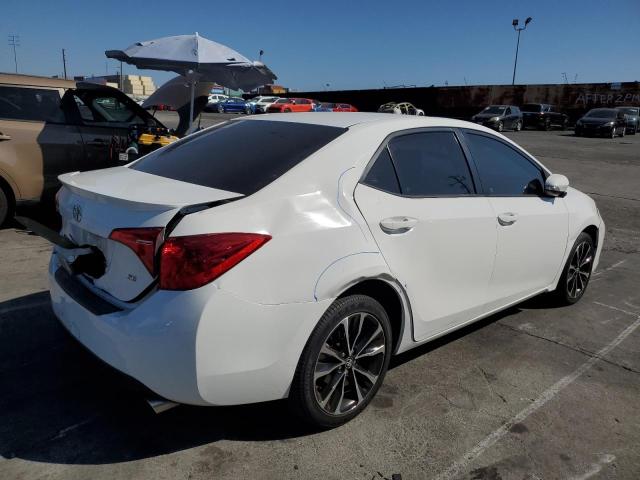 5YFBURHEXJP749123 - 2018 TOYOTA COROLLA L Beyaz fotoğraf 3