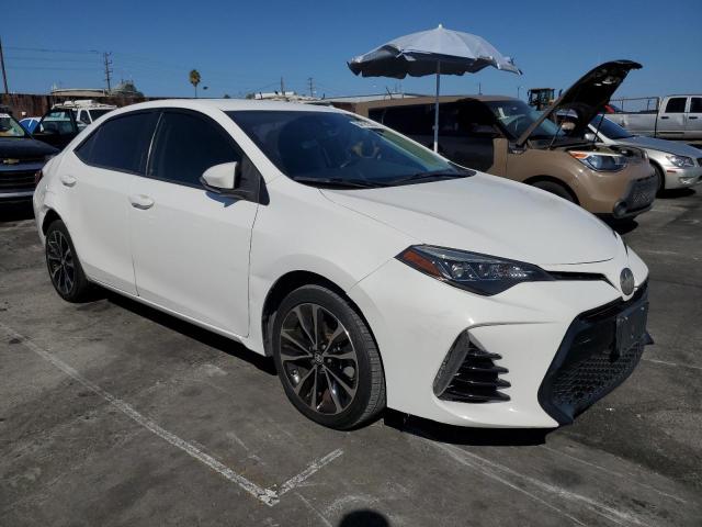 5YFBURHEXJP749123 - 2018 TOYOTA COROLLA L Beyaz fotoğraf 4