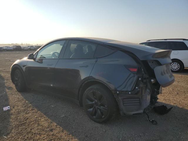 7SAYGAEE2SF218229 - 2025 TESLA MODEL Y Сірий фото 2