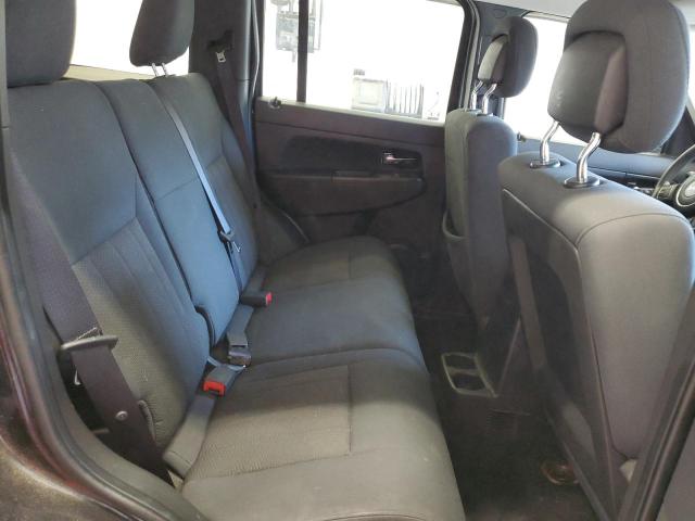 1C4PJMAK4CW173007 - 2012 JEEP LIBERTY SPORT BLACK photo 11