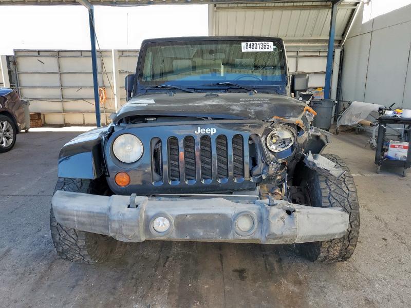 1J4GA59138L573998 - 2008 JEEP WRANGLER U SAHARA BLACK photo 5