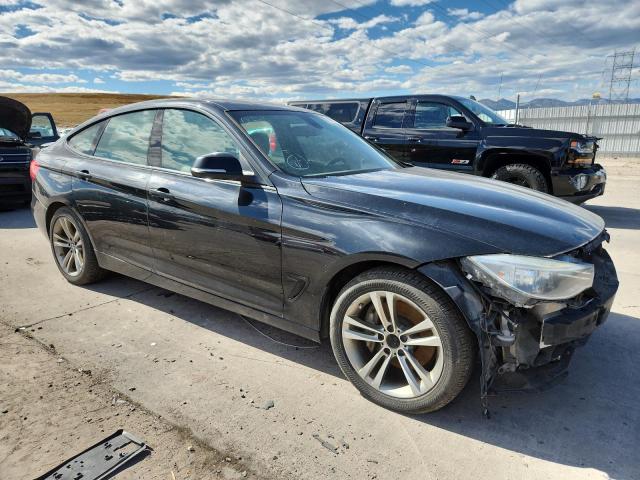 WBA3X9C5XFD868607 - 2015 BMW 335 XIGT BLACK photo 4