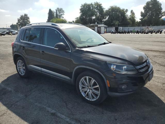 WVGAV3AX0DW561039 - 2013 VOLKSWAGEN TIGUAN S Schwarz Foto 4