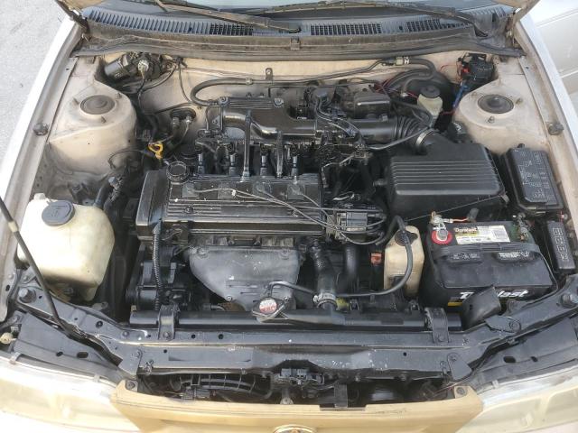 1NXBA02E9VZ546662 - 1997 TOYOTA COROLLA BASE ذهبي صورة 11