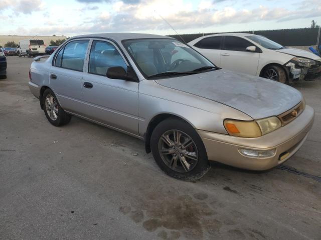 1NXBA02E9VZ546662 - 1997 TOYOTA COROLLA BASE ذهبي صورة 4