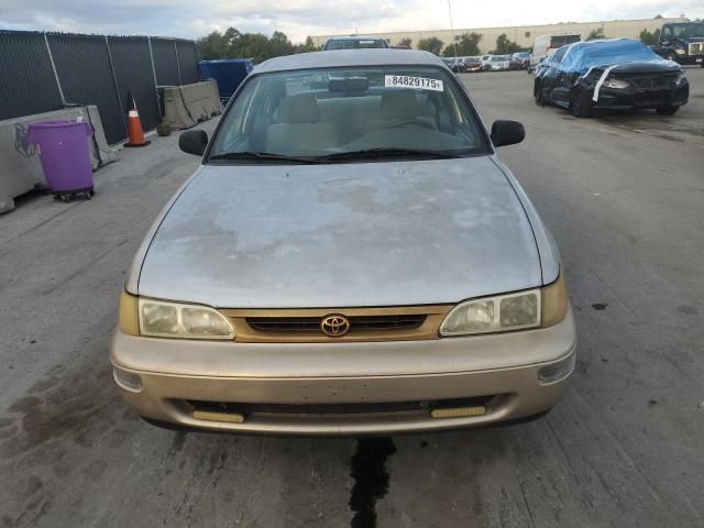 1NXBA02E9VZ546662 - 1997 TOYOTA COROLLA BASE ذهبي صورة 5