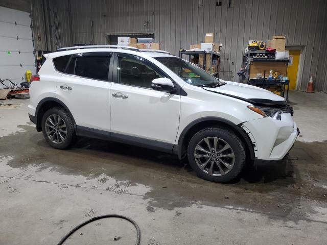JTMDFREV6JJ203320 - 2018 TOYOTA RAV4 LIMITED Սպիտակ լուսանկար 4