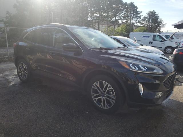 1FMCU9H65MUA12573 - 2021 FORD ESCAPE SEL BLACK photo 4