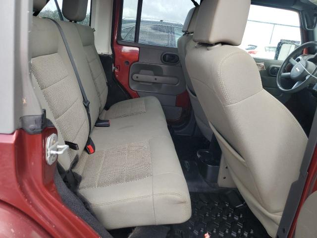 1J4GA59199L771647 - 2009 JEEP WRANGLER U SAHARA BURGUNDY photo 10