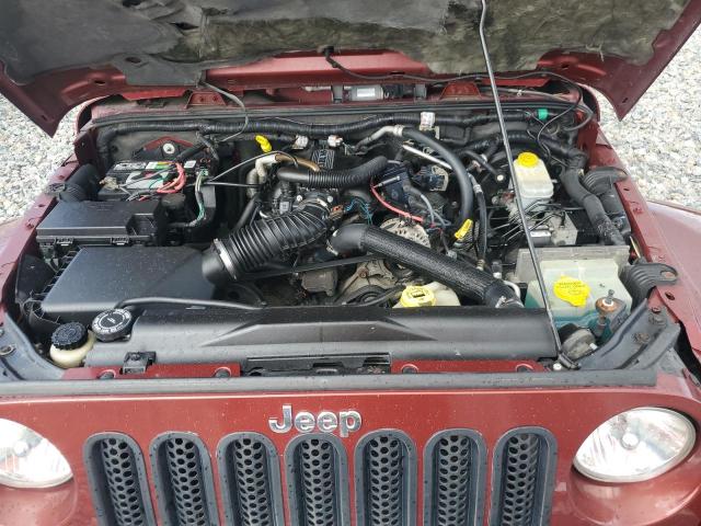 1J4GA59199L771647 - 2009 JEEP WRANGLER U SAHARA BURGUNDY photo 11