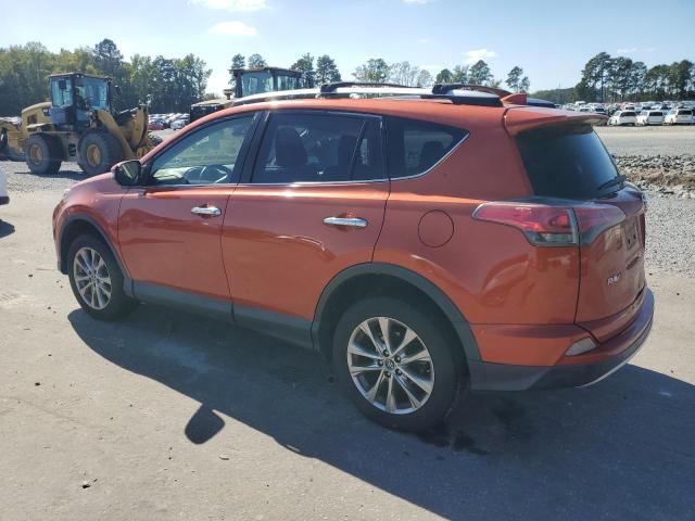JTMDFREV4GD181793 - 2016 TOYOTA RAV4 LIMITED ORANGE photo 2