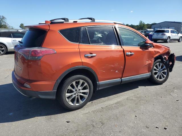 JTMDFREV4GD181793 - 2016 TOYOTA RAV4 LIMITED ORANGE photo 3