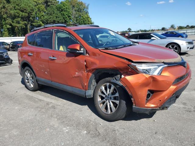 JTMDFREV4GD181793 - 2016 TOYOTA RAV4 LIMITED ORANGE photo 4