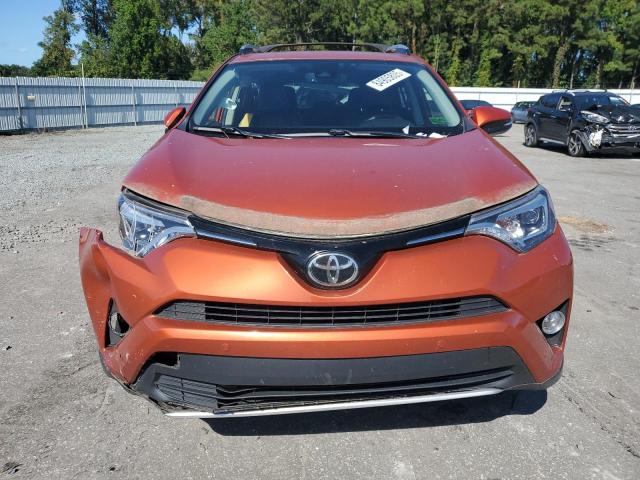 JTMDFREV4GD181793 - 2016 TOYOTA RAV4 LIMITED ORANGE photo 5