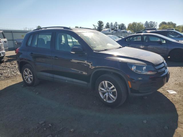 WVGAV7AX3HK002248 - 2017 VOLKSWAGEN TIGUAN S BLACK photo 4