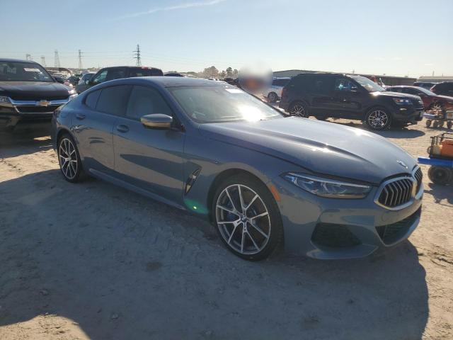 WBAGV8C08NCK07510 - 2022 BMW M850XI BLUE photo 4