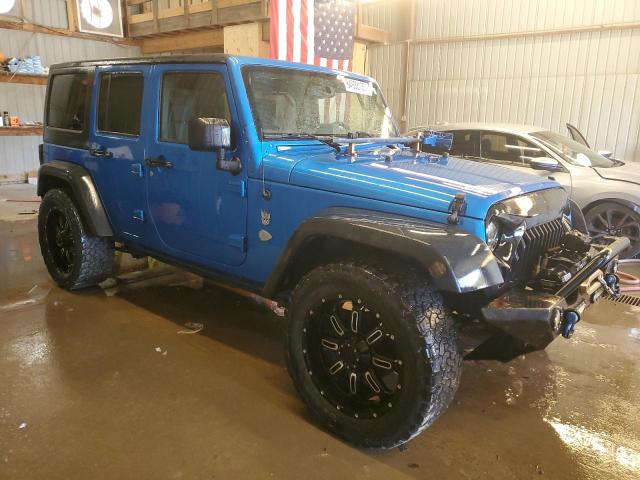 1C4BJWDG1GL186771 - 2016 JEEP WRANGLER U SPORT Blau Foto 4