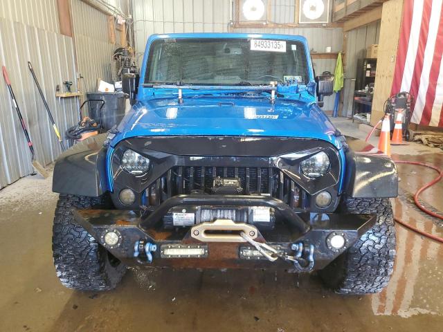 1C4BJWDG1GL186771 - 2016 JEEP WRANGLER U SPORT Blau Foto 5