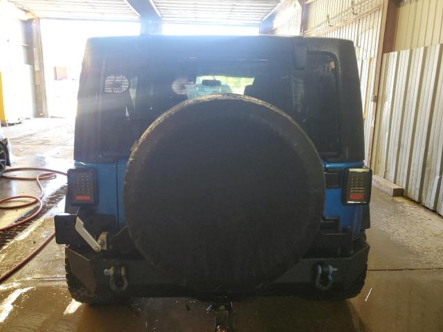 1C4BJWDG1GL186771 - 2016 JEEP WRANGLER U SPORT Blau Foto 6