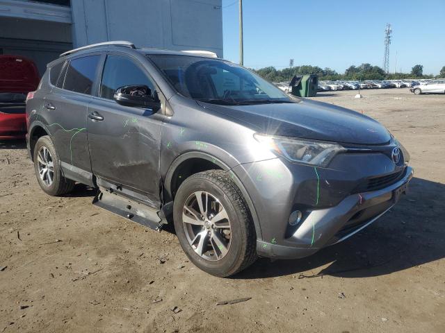 JTMRFREV6GD186662 - 2016 TOYOTA RAV4 XLE GRAY photo 4