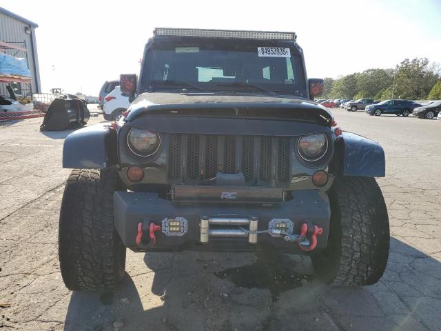 1J4BA5H17AL144056 - 2010 JEEP WRANGLER U SAHARA Чорний фото 5