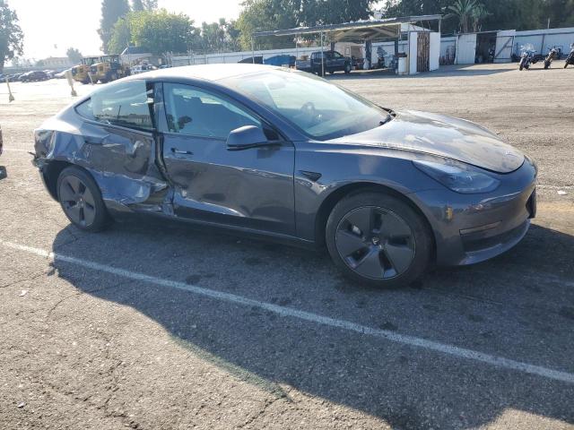 5YJ3E1EA1PF699270 - 2023 TESLA MODEL 3 GRAY photo 4