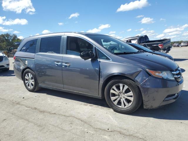 5FNRL5H68GB070894 - 2016 HONDA ODYSSEY EXL GRAY photo 4