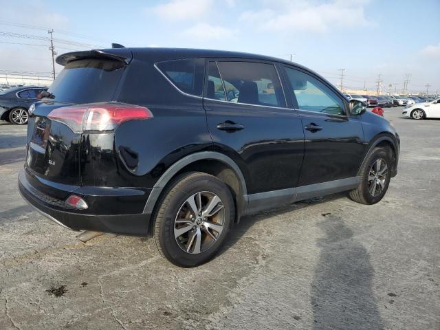 2T3WFREV6HW388442 - 2017 TOYT RAV4 XLE Qara foto 3