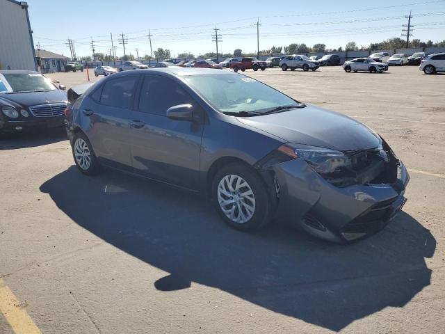 2T1BURHE8JC039864 - 2018 TOYOTA COROLLA L Blau Foto 4