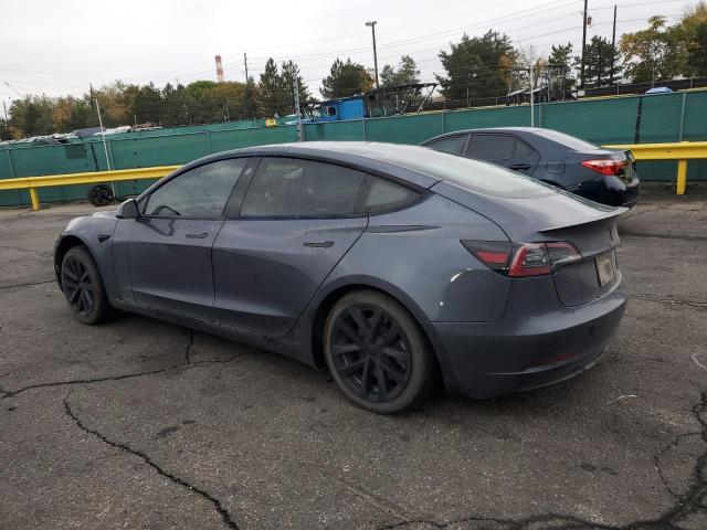 5YJ3E1EA2PF660798 - 2023 TESLA MODEL 3 Серый фото 2