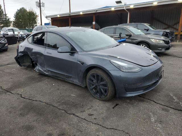 5YJ3E1EA2PF660798 - 2023 TESLA MODEL 3 Серый фото 4