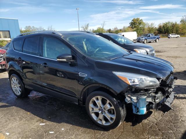 1FMCU9J90EUD50095 - 2014 FORD ESCAPE TITANIUM BLACK photo 4