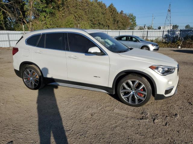 WBXHT3C33GP883176 - 2016 BMW X1 XDRIVE28I WHITE photo 4