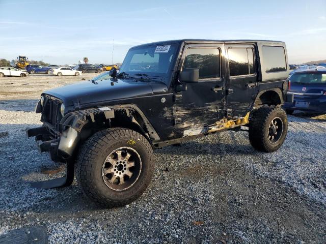 1J4BA3H15BL627700 - 2011 JEEP WRANGLER U SPORT BLACK photo 1