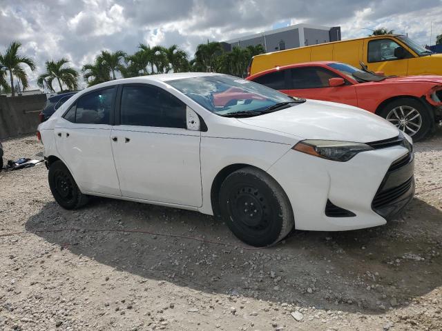 5YFBURHE9KP944146 - 2019 TOYOTA COROLLA L WHITE photo 4